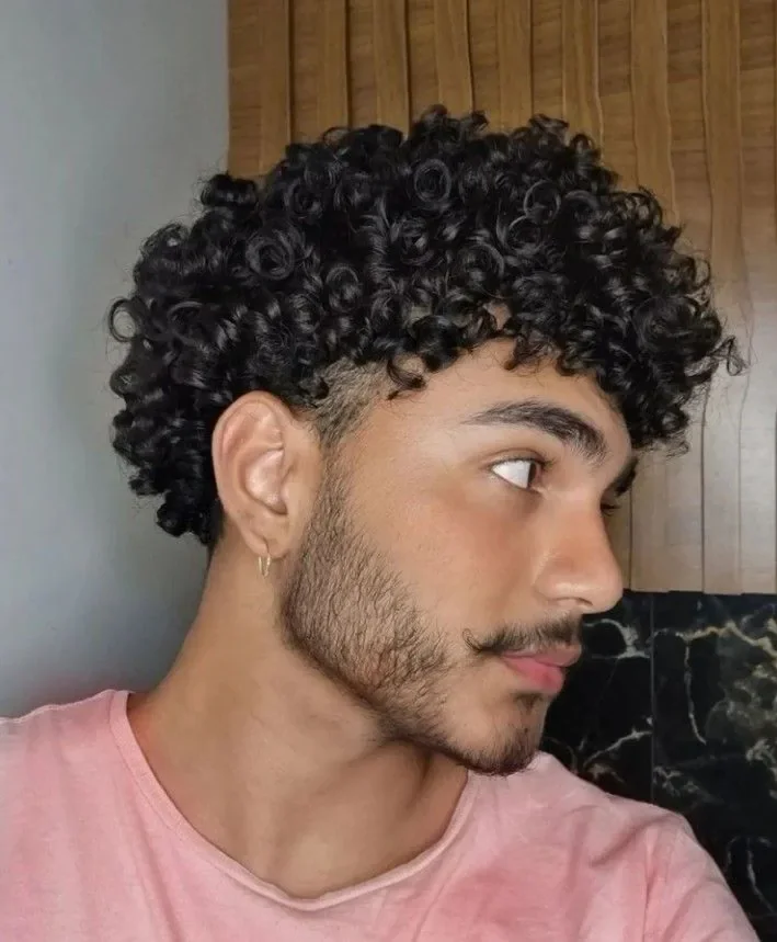 Cacheado e crespo: volume como assinatura — corte de cabelo masculino, exemplo 12